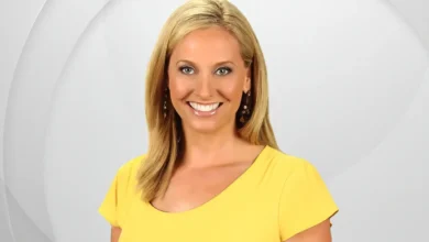 Kara Sundlun smiling on WFSB set with Emmy award, representing her 25-year journalism career from hidden family roots to broadcast excellence in Connecticut.
