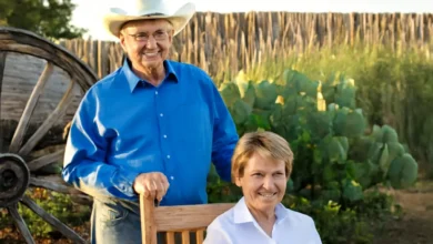 Milt Bradford standing with his wife Mary resting on a chair, symbolizing enduring family ties and his profound legacy in ranching and equine expertise
