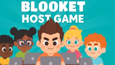 Teacher hosting Blooket game in classroom with engaged students cheering during Tower Defense mode, 2025 classroom technology